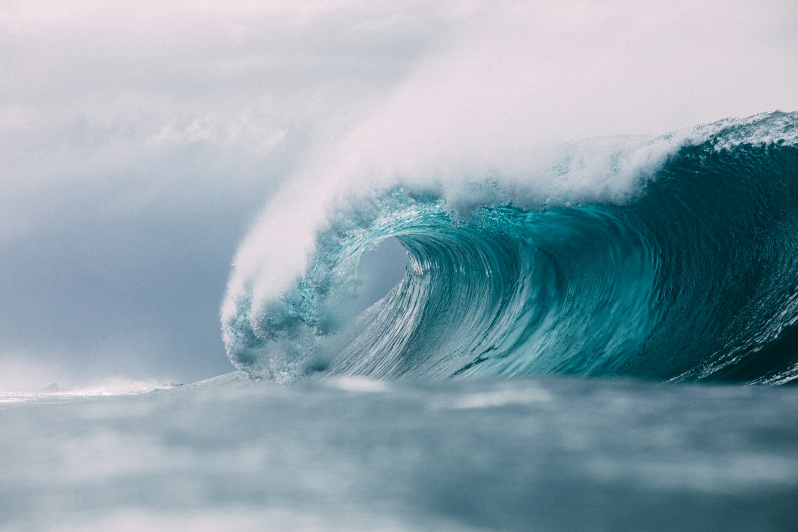 white and blue ocean waves